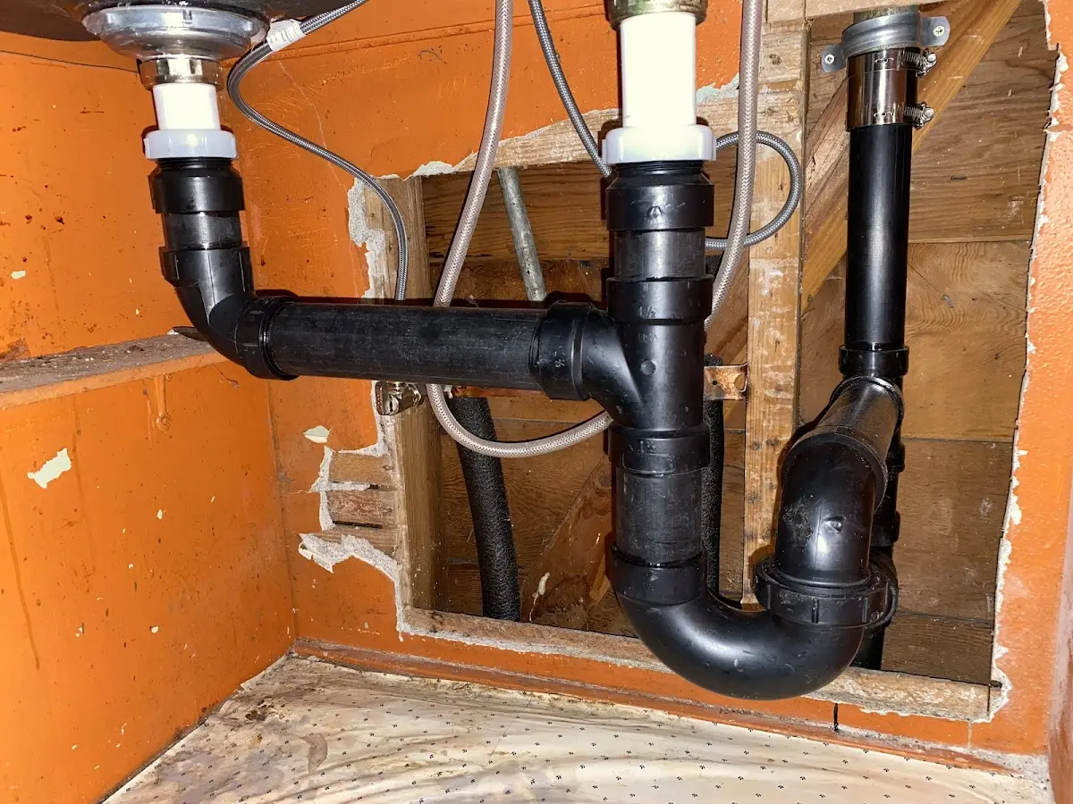 Professional Garbage Disposal Repair equipment and tools on the job in Sappington
